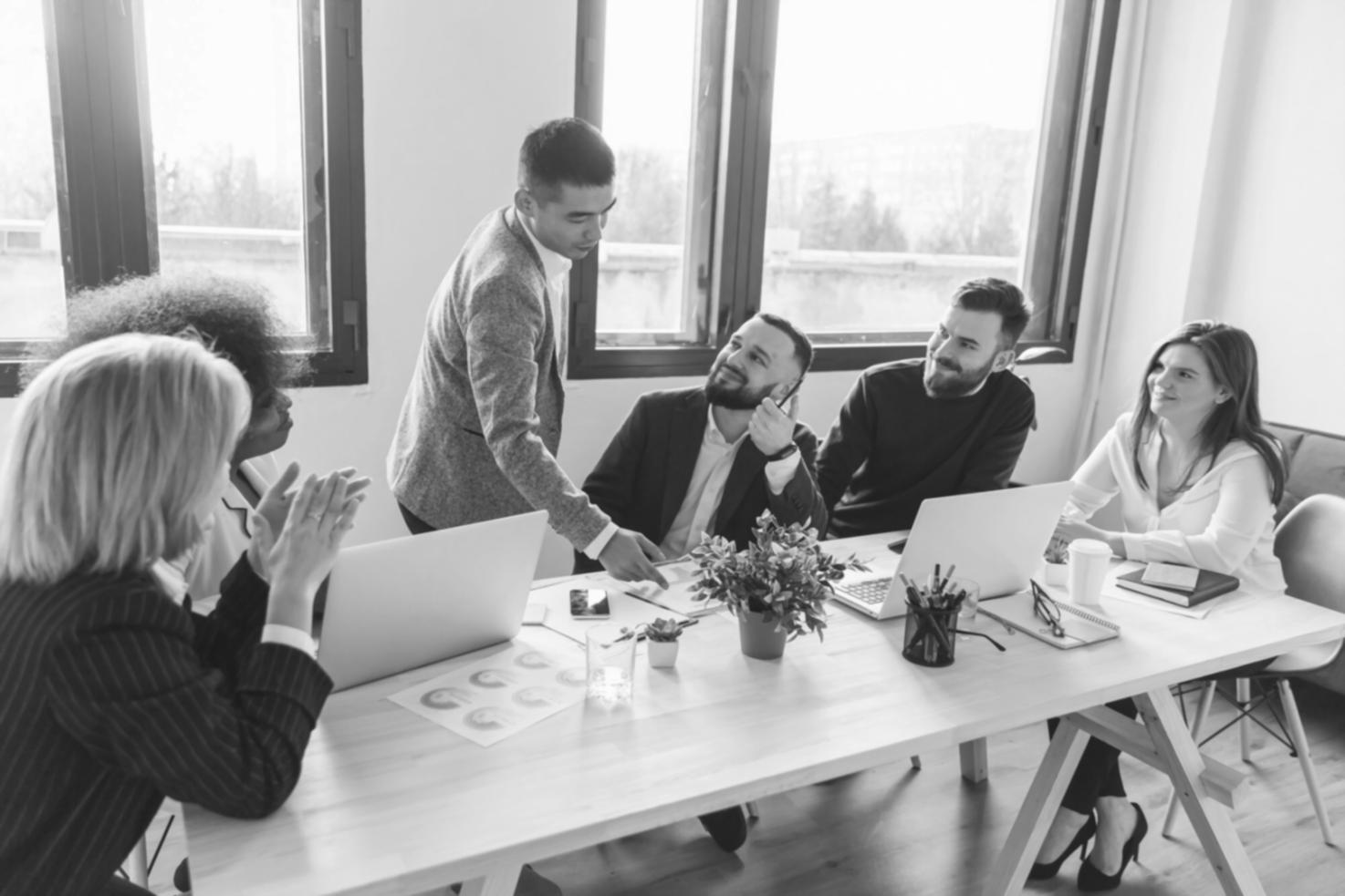 Finance professionals working together on complex financial modeling projects